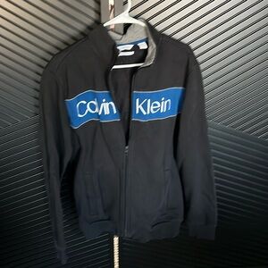 L Calvin Klein zip-up